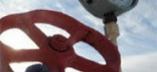 A close-up image of a measuring instrument with a gauge, made of steel and aluminum materials.