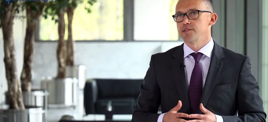 A white-collar worker standing confidently in formal wear and glasses, symbolizing professionalism and vision care. #InvestorzyTy #FashionGoals
