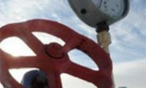 A close-up image of a measuring instrument with a gauge, made of steel and aluminum materials.